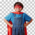 Adorable little asian boy wearing a mask and a cape while pretending to be a superhero against an orange studio background. Cute happy boy pretending to be a character for halloween