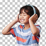 A cute young asian boy enjoying listening to music from his headphones. Adorable Chinese kid feeling the magic of music while posing against a blue studio background