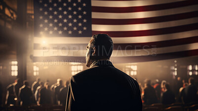 Business man silhouette figure at big event, groups of people, big American flag hanging over stage.