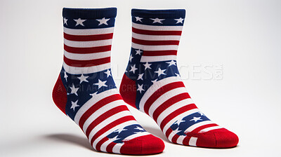 Socks with American flag stars and stripes on white background. Patriotism concept