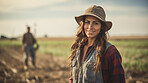 Portrait of female farmer smiling. Smiling woman posing on a farm