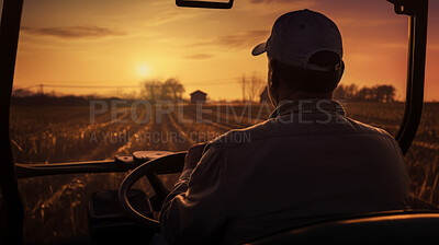Farmer driving a tractor through wheat crop field at sunrise. Silhouette of man with hat