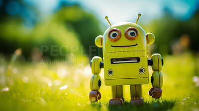 Mini robot on green grass background. Eco-friendly sustainable technology concept