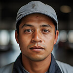 Confident serious man in warehouse. Worker, supervisor and industrial contractor at project