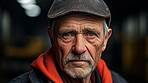 Confident serious mature older man in warehouse. Worker, supervisor and industrial contractor at project