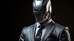 Futuristic male robot in business suit. Against black backdrop.