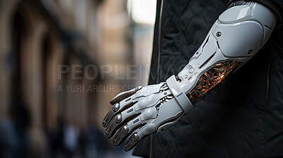 Robot mechanical, prosthetic arm or hand in city. Futuristic cyborg concept.