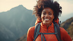 Happy african american woman hiking outdoors. Fitness hike and travel journey