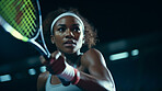 Action Portrait of woman training for tennis match. Confident and focused athlete