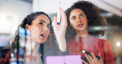 Planning, strategy and business women on glass board teamwork, collaboration and creative ideas for project. Biracial people or staff for workflow management, schedule or planner on window reflection