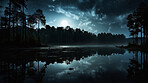 Views of beautiful lake at night. Moon reflection on crystal clear waters.