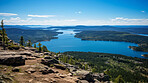 High mountain view of beautiful lake. Landscape view with sky and forest.