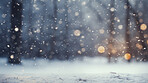 Winter snow background with snow-covered trees in the forest. Snow fall with bokeh