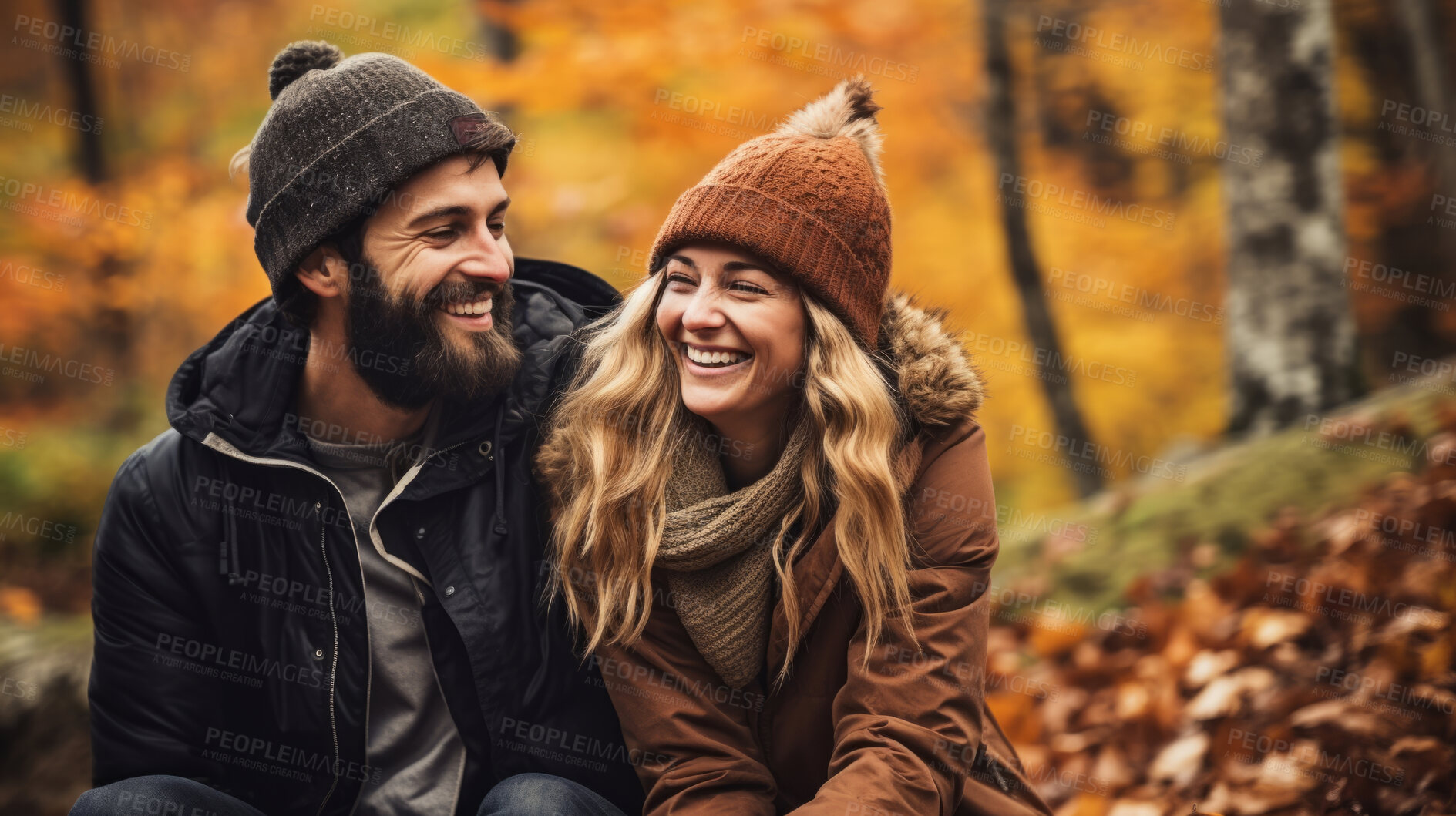 Buy stock photo Happy couple in a autumn forest. Young couple in love having fun enjoying nature