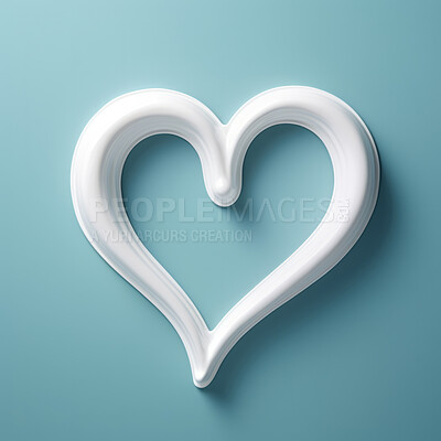 White toothpaste in heart shape on blue copyspace background. Healthy teeth concept