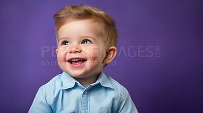 Buy stock photo Portrait of a toddler posing against a purple background. happy smiling boy