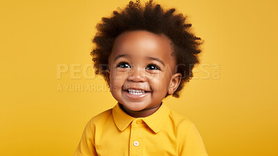 Buy stock photo Portrait of a toddler posing against a yellow background. happy smiling boy