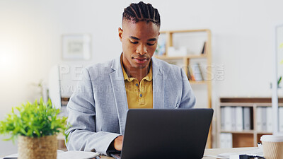 Email, phone and businessman working, planning and in communication with people on the internet at work. African manager, worker or employee typing on a laptop and reading on a mobile in an office