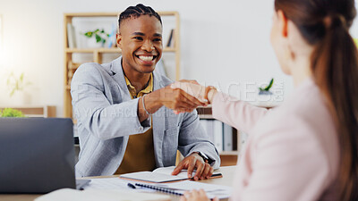 Businessman, interview and handshake for hiring, partnership or agreement in recruitment at the office. Happy employer shaking hands with employee or new recruit for meeting, greeting or deal at desk