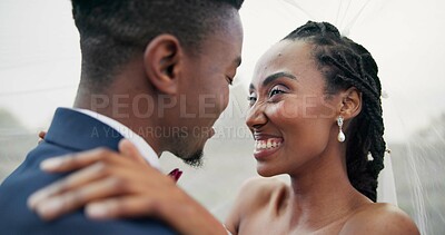 Outdoor, kiss and black couple with marriage, wedding and hug with happiness, romance and celebration. African man, happy woman and embrace outside, love and bride with groom, romantic and commitment