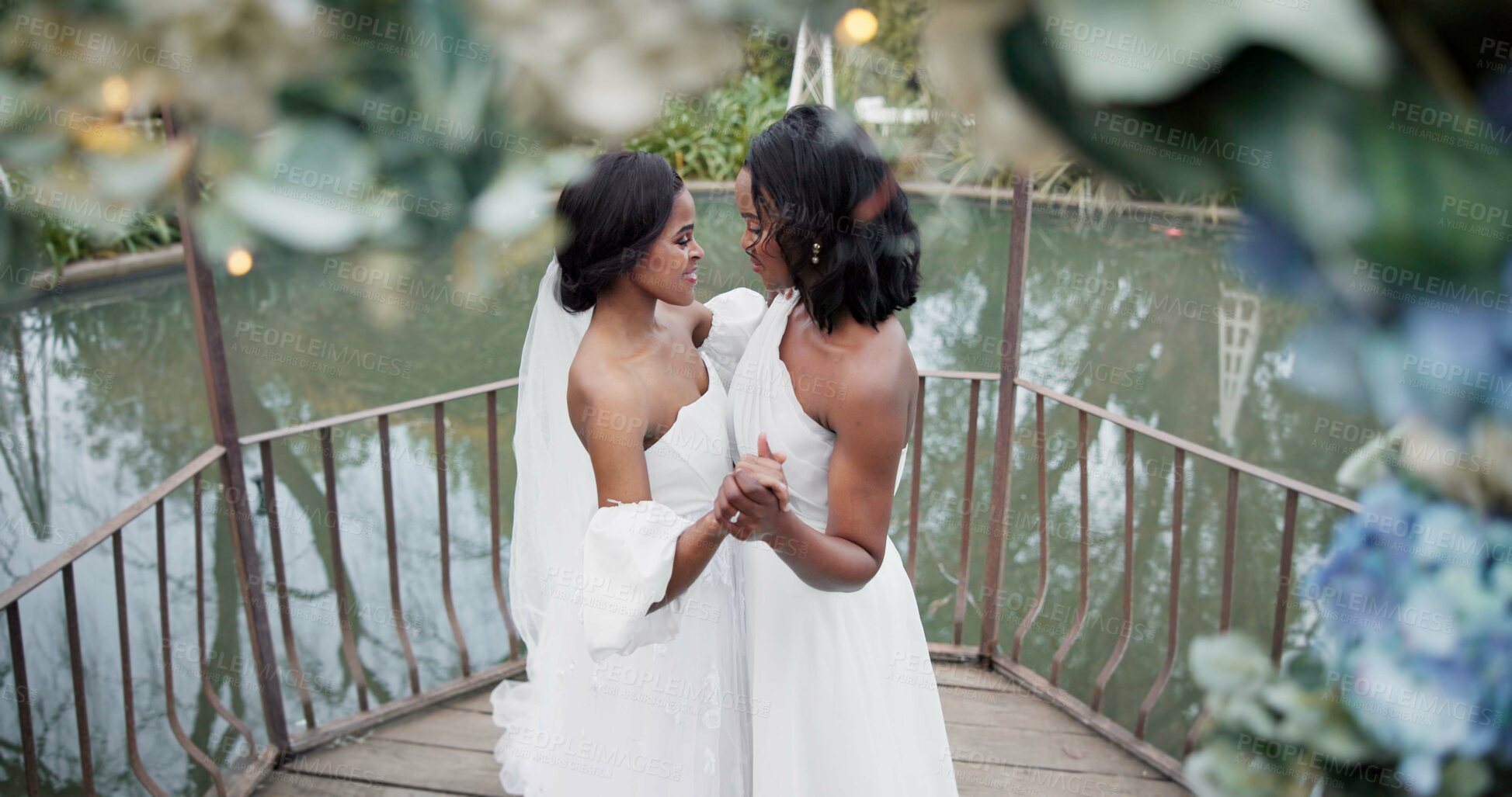 Buy stock photo Wedding, lesbian and women dancing outdoor together at ceremony for celebration, happiness and romance. Marriage, love and lgbtq people holding hands and moving with smile in elegant dress in nature