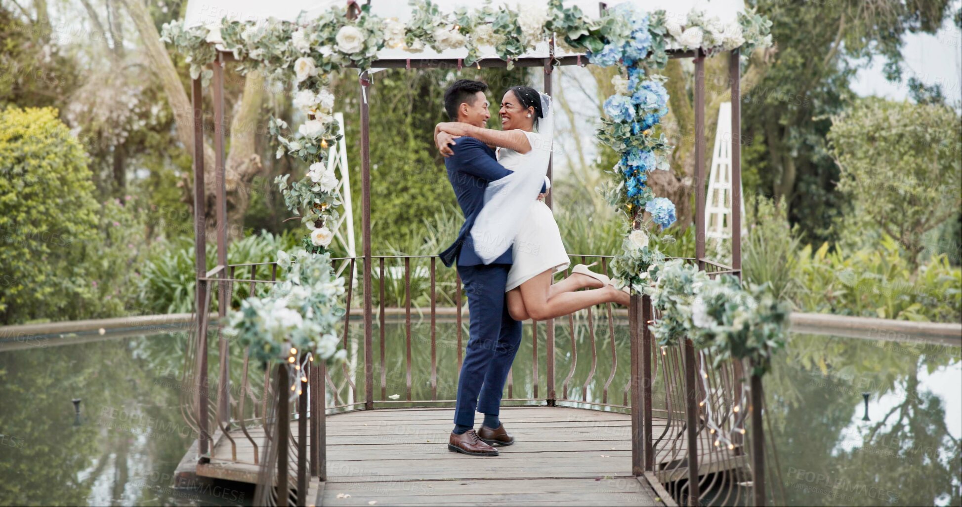 Buy stock photo Couple, wedding and dance with spin in celebration of ceremony with gratitude, smile or support. Happy partnership, laugh or marriage in romance with excited for beauty, dress or commitment in garden