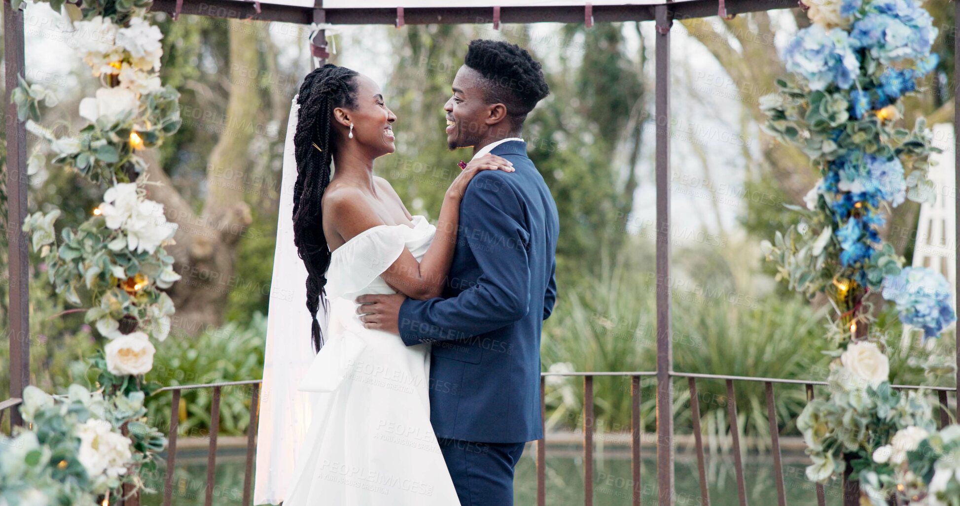 Buy stock photo Wedding, dance and black couple in garden with love, celebration and excited future together. Gazebo, man and woman at luxury marriage reception with flowers, music and happiness at party in nature.