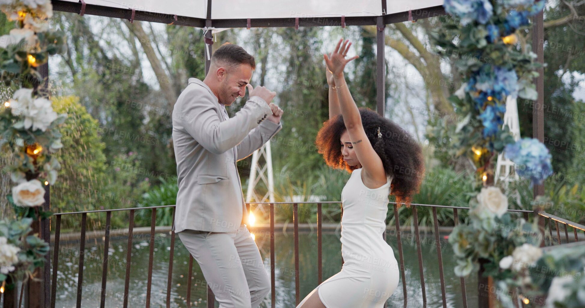 Buy stock photo Dance, happy and a couple at a wedding with love, bonding and fun in marriage. Smile, excited and a young man and woman with celebration, moving and energy together after commitment in relationship