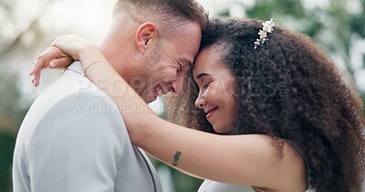 Wedding, couple and love dancing outdoor together with happiness for celebration, care and commitment. Marriage, man and woman moving with hug, bride and groom embrace for first dance in nature