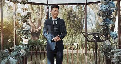 Groom, waiting and man in wedding or ceremony at alter with anxiety, stress or nervous energy for marriage or commitment. Formal, suit and excited person standing in aisle with flowers and nature