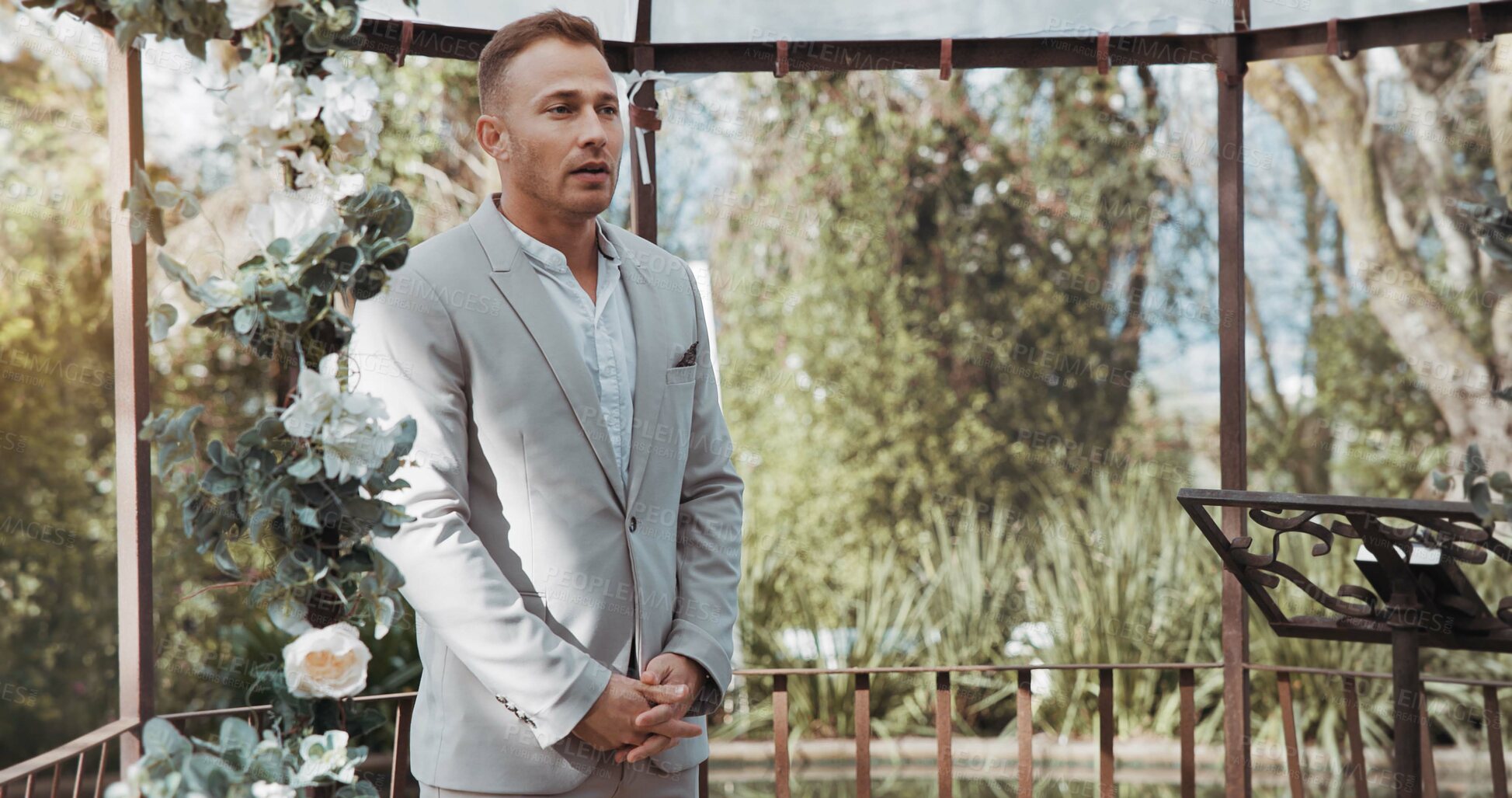 Buy stock photo Waiting, groom and man in wedding and ceremony at alter with anxiety, stress or nervous energy for marriage or commitment. Formal, suit and excited person standing in aisle with flowers and nature