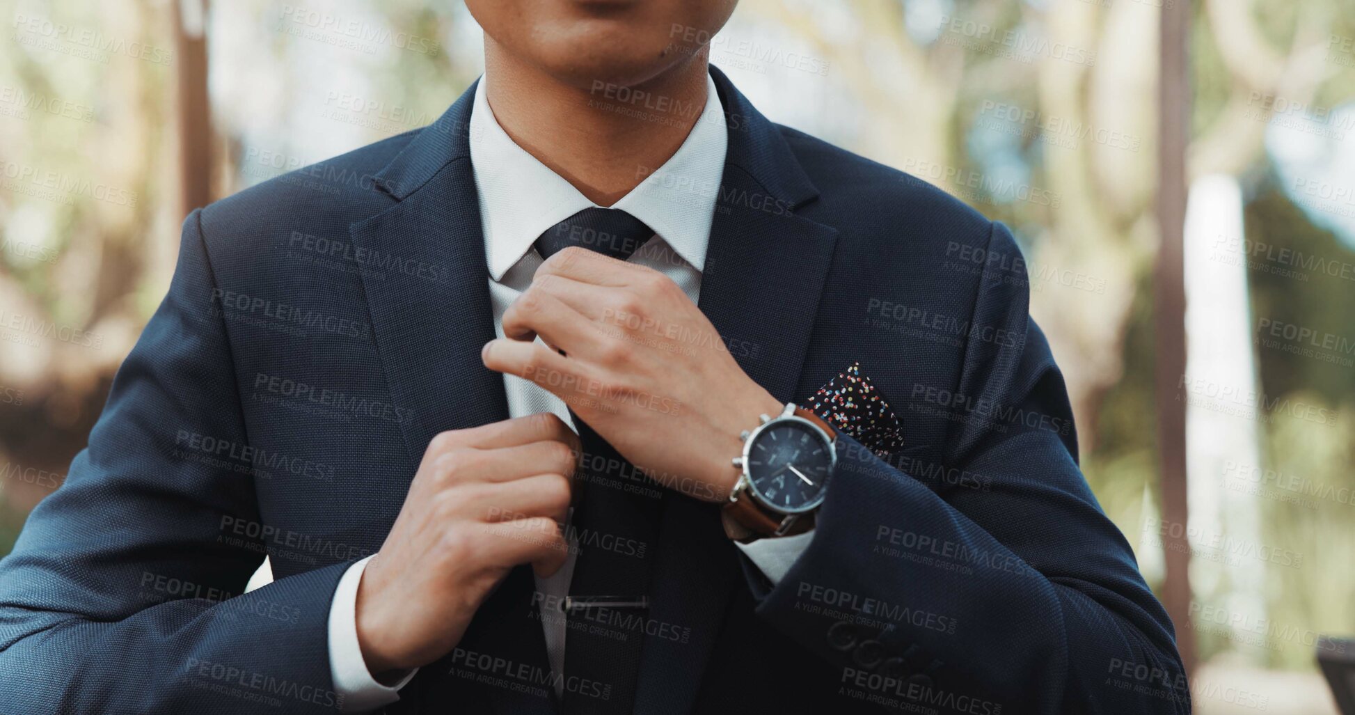 Buy stock photo Hands, wedding and tie with a groom getting reading for his marriage ceremony outdoor at an event closeup. Fashion, watch and a man dressing in a smart or formal suit for a celebration of love