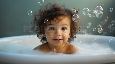 Smiling toddler bathes in bathtub with foam and bubbles. Happy baby bath time