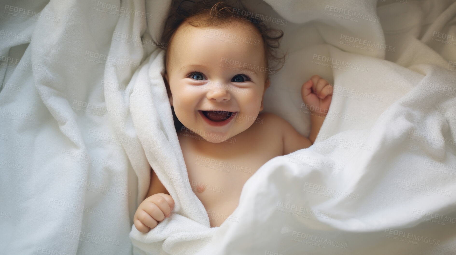 Buy stock photo Portrait of a happy baby wrapped in a towel or blanket. Toddler smiling after bath time