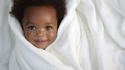 Buy stock photo Portrait of a happy baby wrapped in a towel or blanket. Toddler smiling after bath time