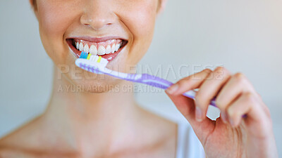 Buy stock photo Toothpaste, toothbrush and woman brushing teeth in bathroom for health, happiness and wellness in morning. Girl, portrait and cleaning mouth or healthcare, dental care or oral hygiene, smile or home