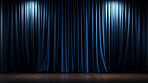 Empty theater stage with blue velvet curtains. Spotlight showtime copy space