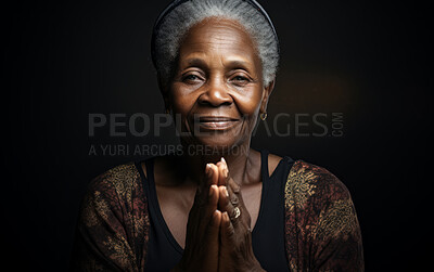 Buy stock photo Senior African American woman smiling while praying. Studio backdrop. Religion concept.