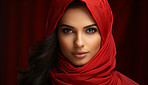close up portrait of beautiful muslim woman wearing vibrant red scarf. Religion concept.