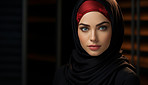 Portrait of beautiful muslim woman. Dark backdrop. Religion concept.