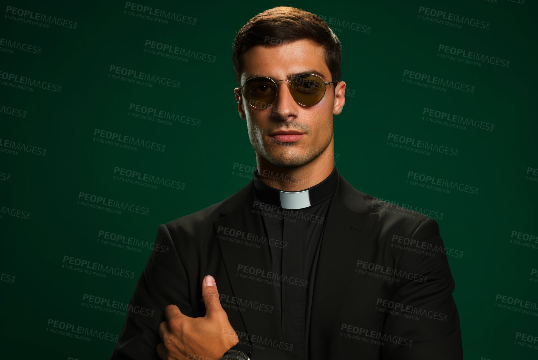 Buy stock photo Studio portrait of young priest. Dark green backdrop. Religion concept.