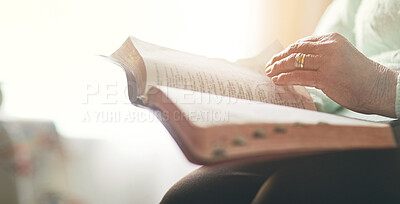 Buy stock photo Closeup shot of an unrecognisable woman reading a bible