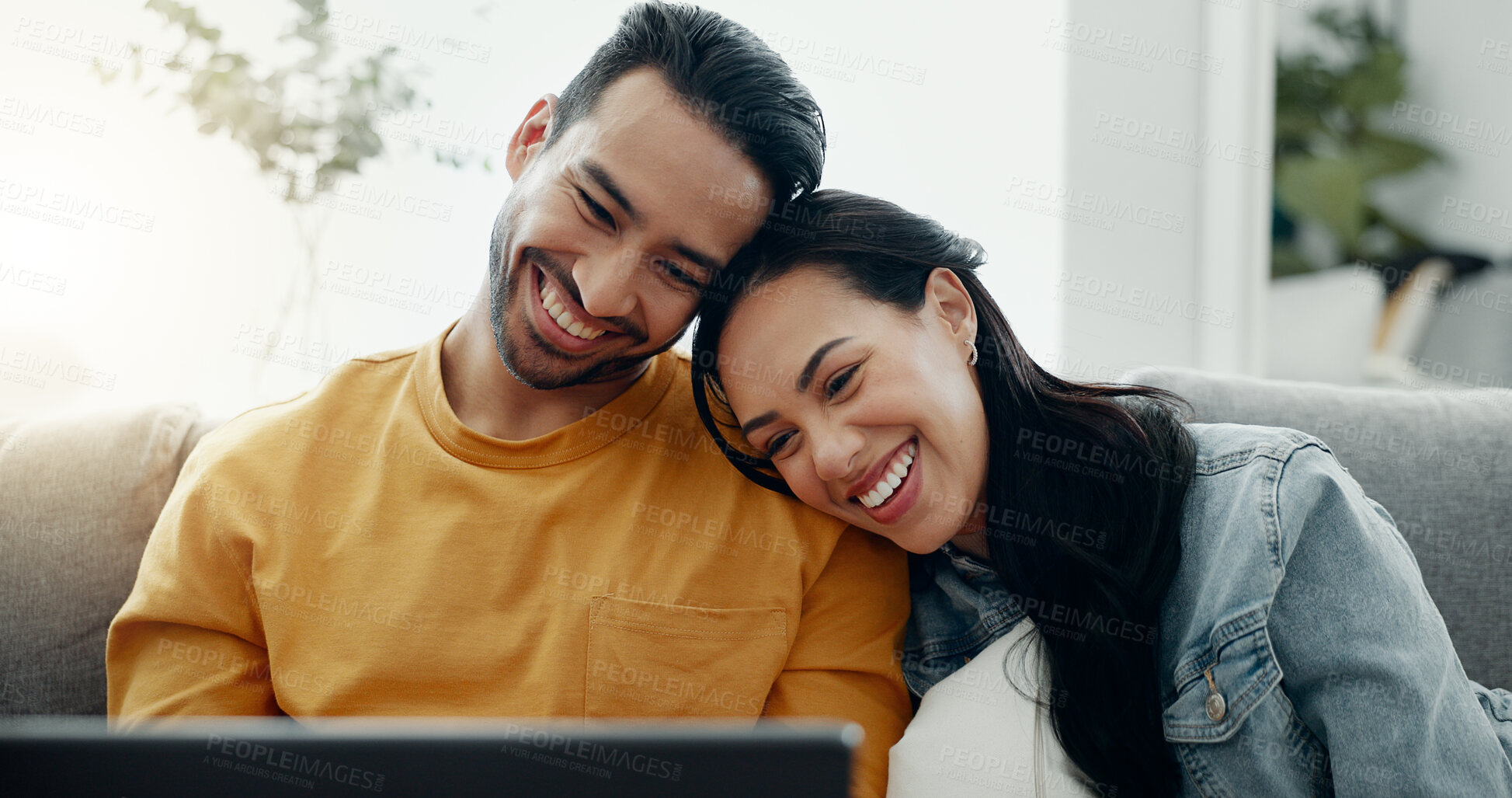 Buy stock photo Home laptop, relax and happy couple watch funny video, social media meme or reading web blog, article or post. Smile, wellness and lounge man, woman or people check online relationship info on sofa