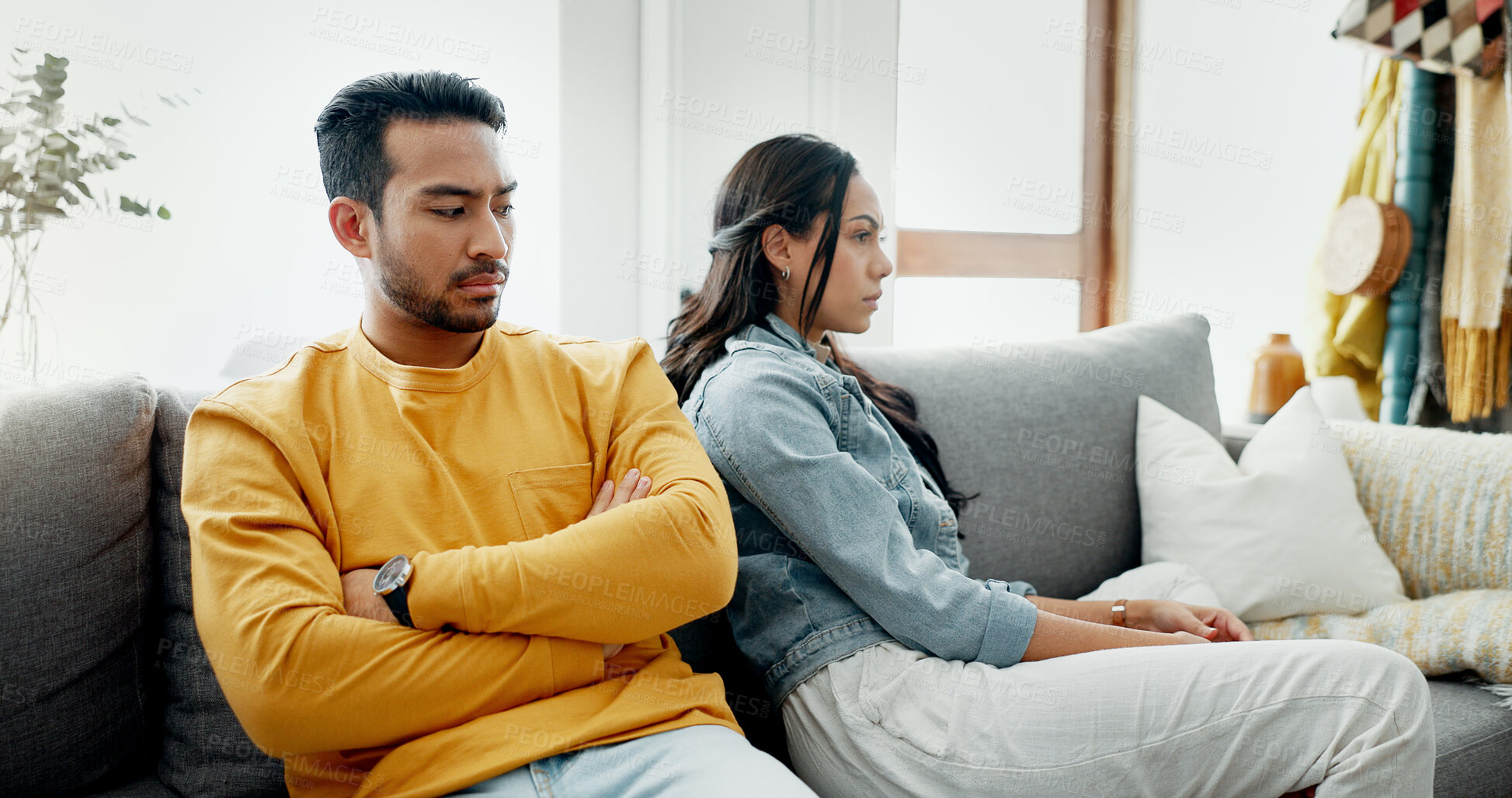 Buy stock photo Conflict, fight and couple angry on a couch together with drama, argument and toxic relationship in a home. Unhappy, divorce and man with marriage problem with woman and stress in a living room sofa