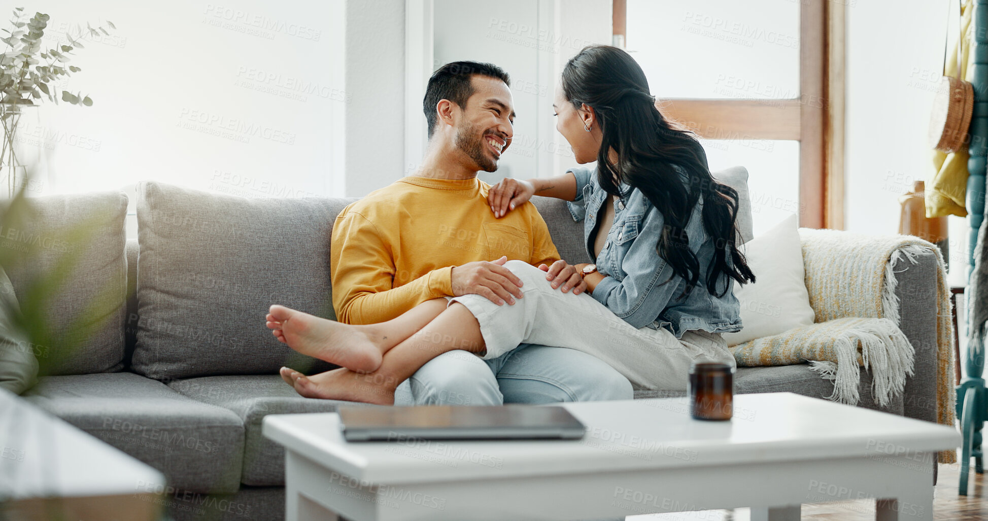 Buy stock photo Happiness, home romance and couple relax, love and smile for relationship bond, care and eye contact with marriage partner. Trust, support and happy man, woman or people sitting on living room sofa