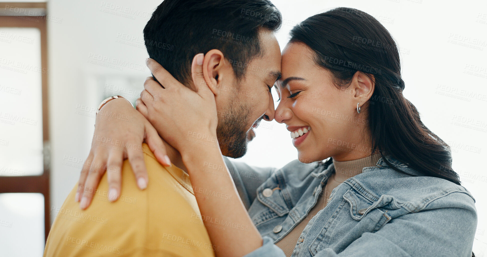 Buy stock photo Couple, forehead touch and hug in living room with love, bonding and happy people together at home. Healthy relationship, trust and support in commitment, partner and dancing, romance and intimacy