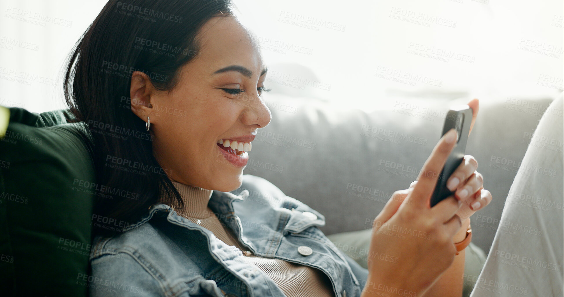 Buy stock photo Home, smile and woman with a smartphone, typing and connection with social media, funny meme and post. Person, mobile user or girl with a cellphone, search internet or network with email notification