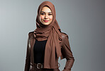 Studio portrait of muslim woman against backdrop. Fashion, religion concept.