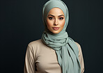 Studio portrait of muslim woman against backdrop. Religion concept.