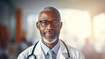 Portrait of male African American doctor standing in a hospital
